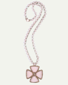 Rose MATI pendant with pink beads and a large, ornate cross-shaped pendant, featuring intricate gemstone accents.