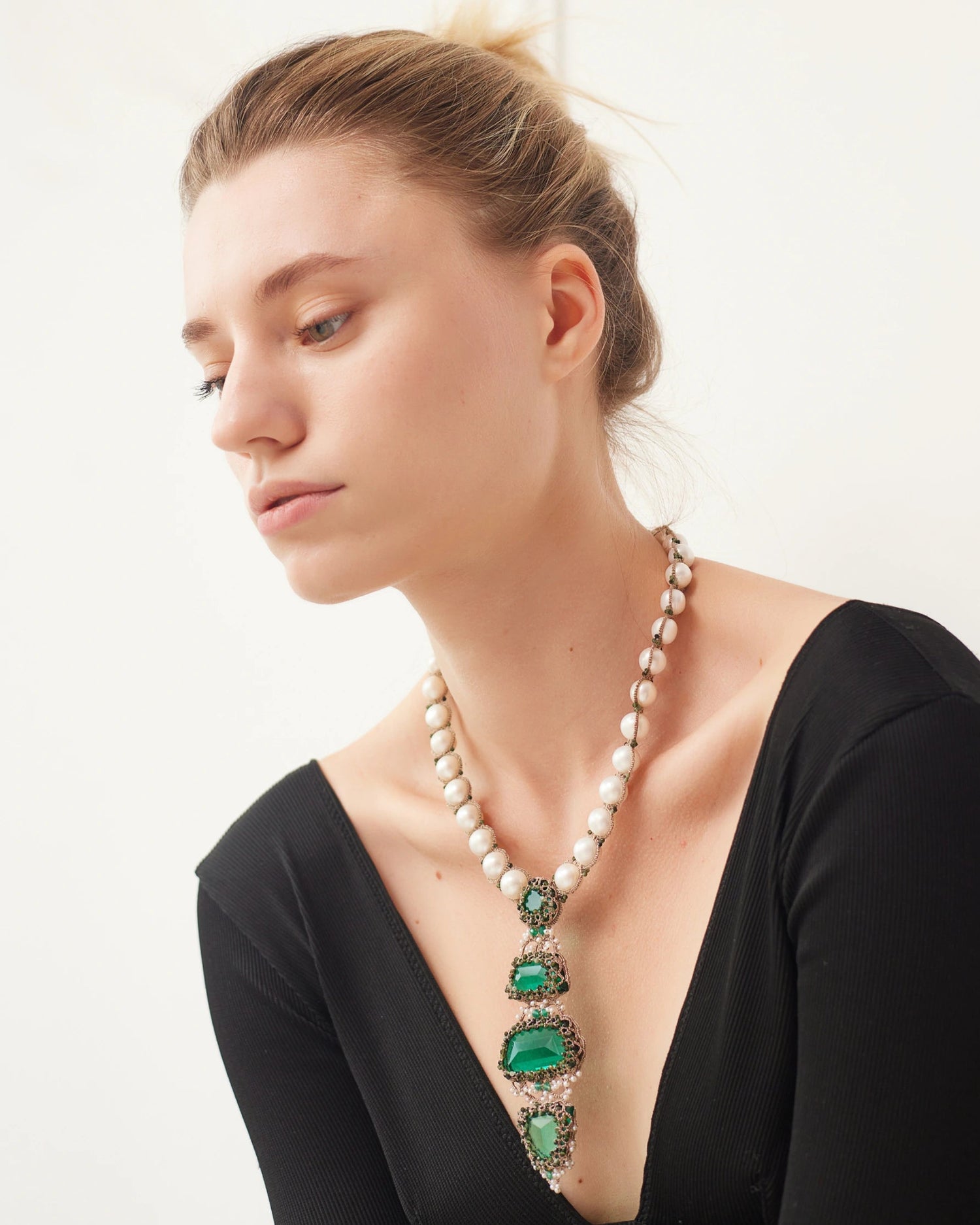 Green silk and emerald MERSEDES pendant with freshwater pearls detail.