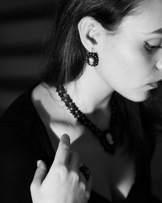 MUZA EARRINGS in Silk, Silver, Glass color Black side view with decorative details and quality finishes
