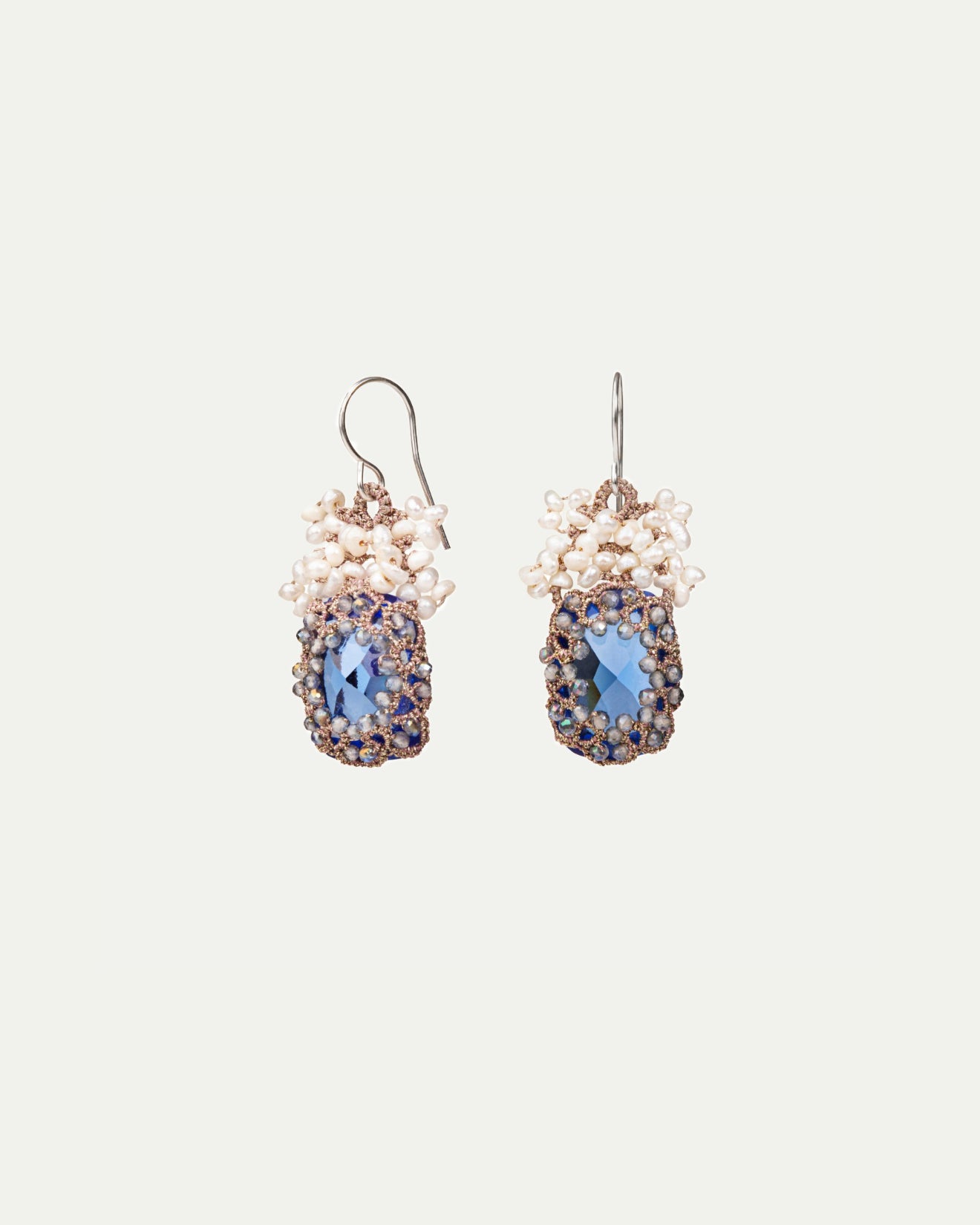 Blue silk, gold, and silver Naya earrings with freshwater pearls and intricate detailing.