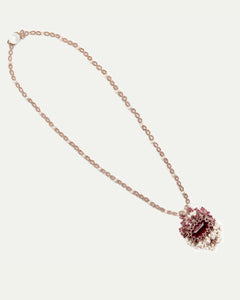 Red Naya Necklace with pearl chain, intricate red gemstone pendant, and delicate bead detailing, elegant jewelry.
