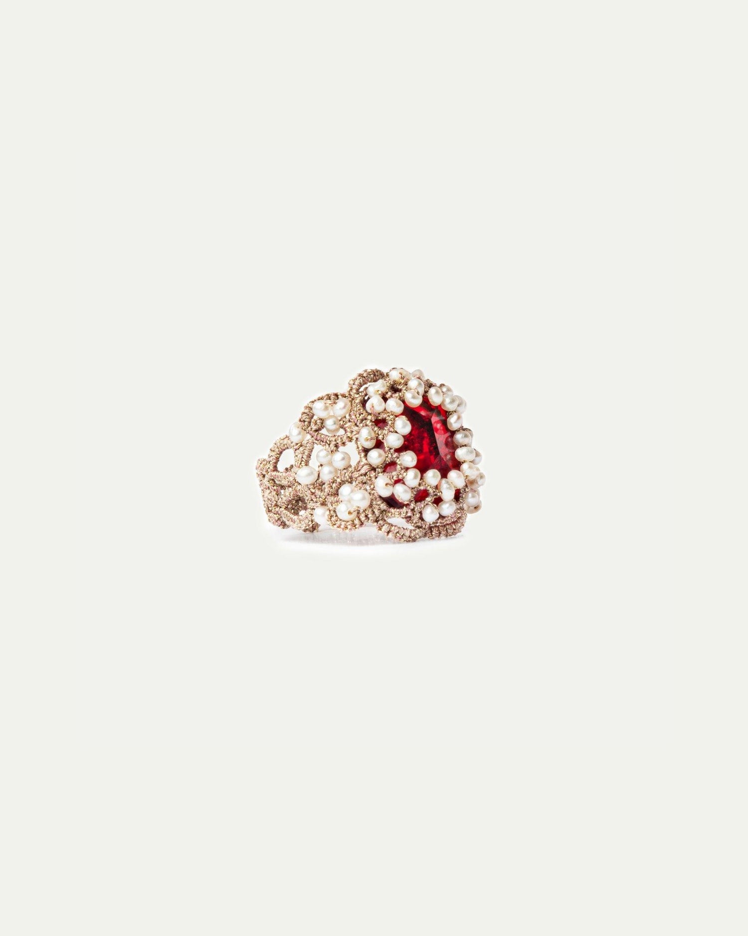 NAYA RING with red crystal, freshwater pearls, silk, and metallized threads detailing.