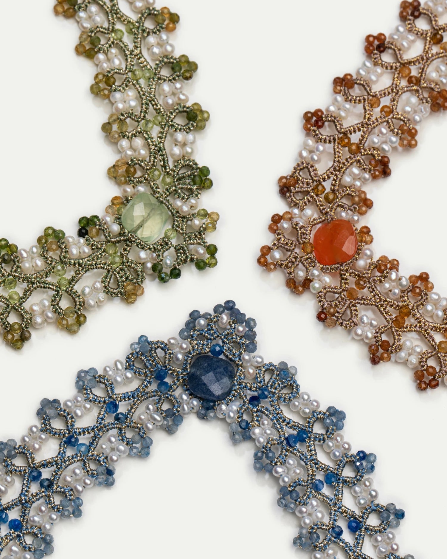 Blue silk and freshwater pearl necklace detail with kyanite accent.