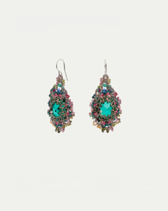 Green earrings with silk, crystal, pearl, sapphire, emerald details; intricate texture and vibrant colors.