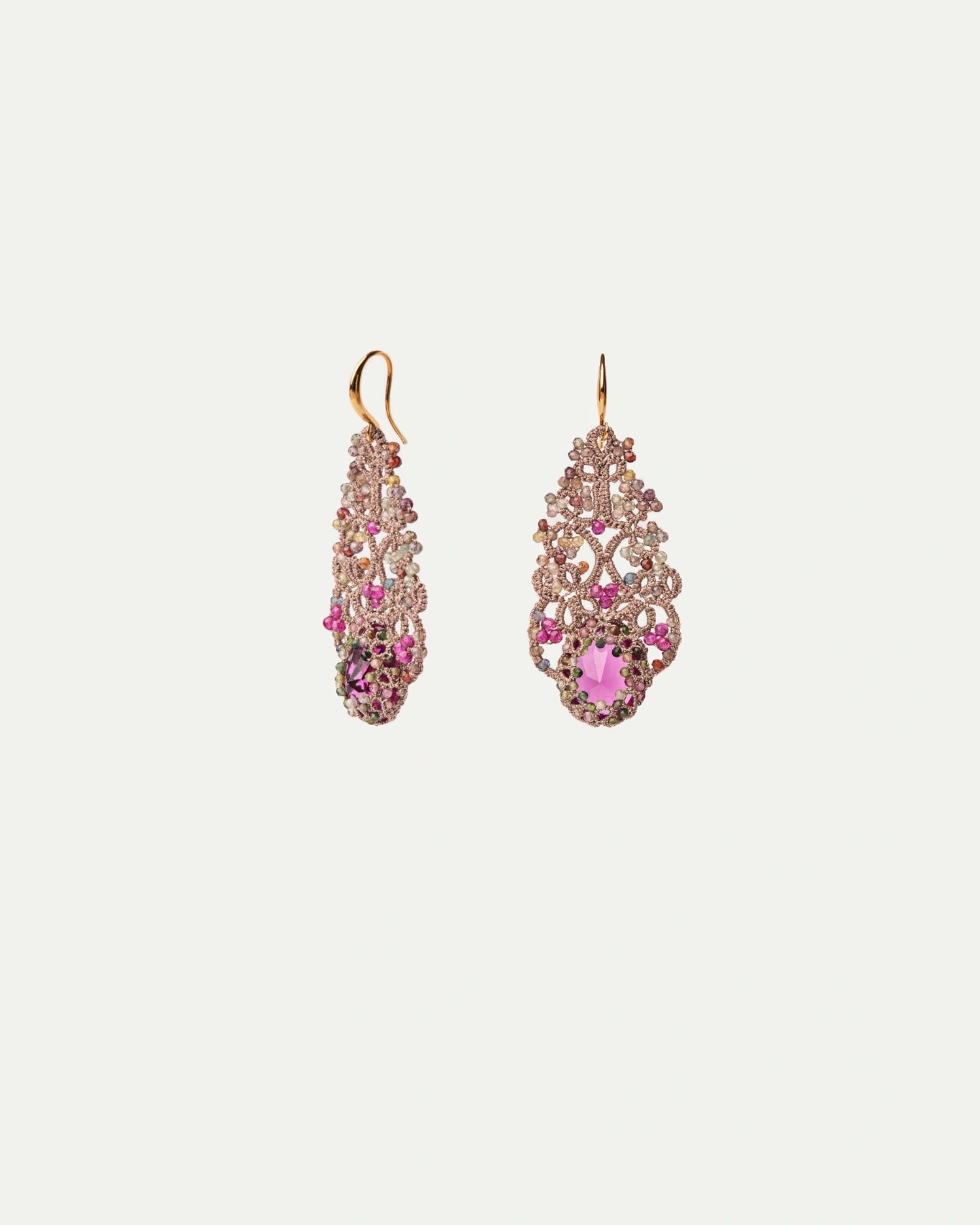 Rose silk earrings with gold hooks, adorned with sapphires and rubies in intricate design.