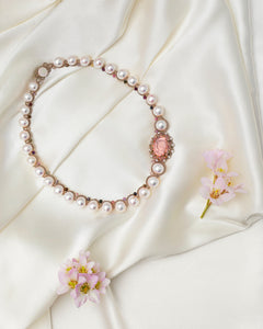 SELENE NECKLACE with rose tourmaline gemstones, freshwater pearls, crystals on silk background.
