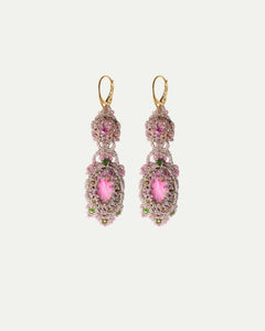 Elegant rose Serena earrings with intricate beadwork, featuring pink and green gems, gold hooks, and ornate design.