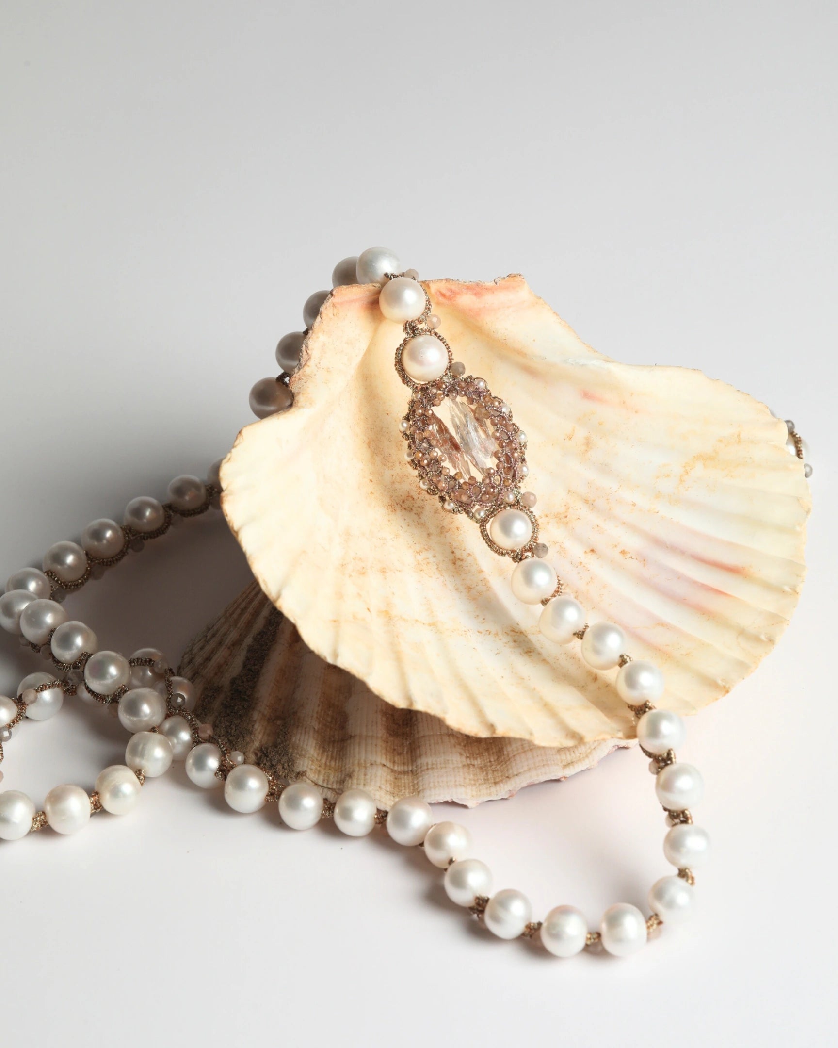 SHAYLA PENDANT with freshwater pearls, moonstone, zircon gemstones, vintage crystal, gold accents.