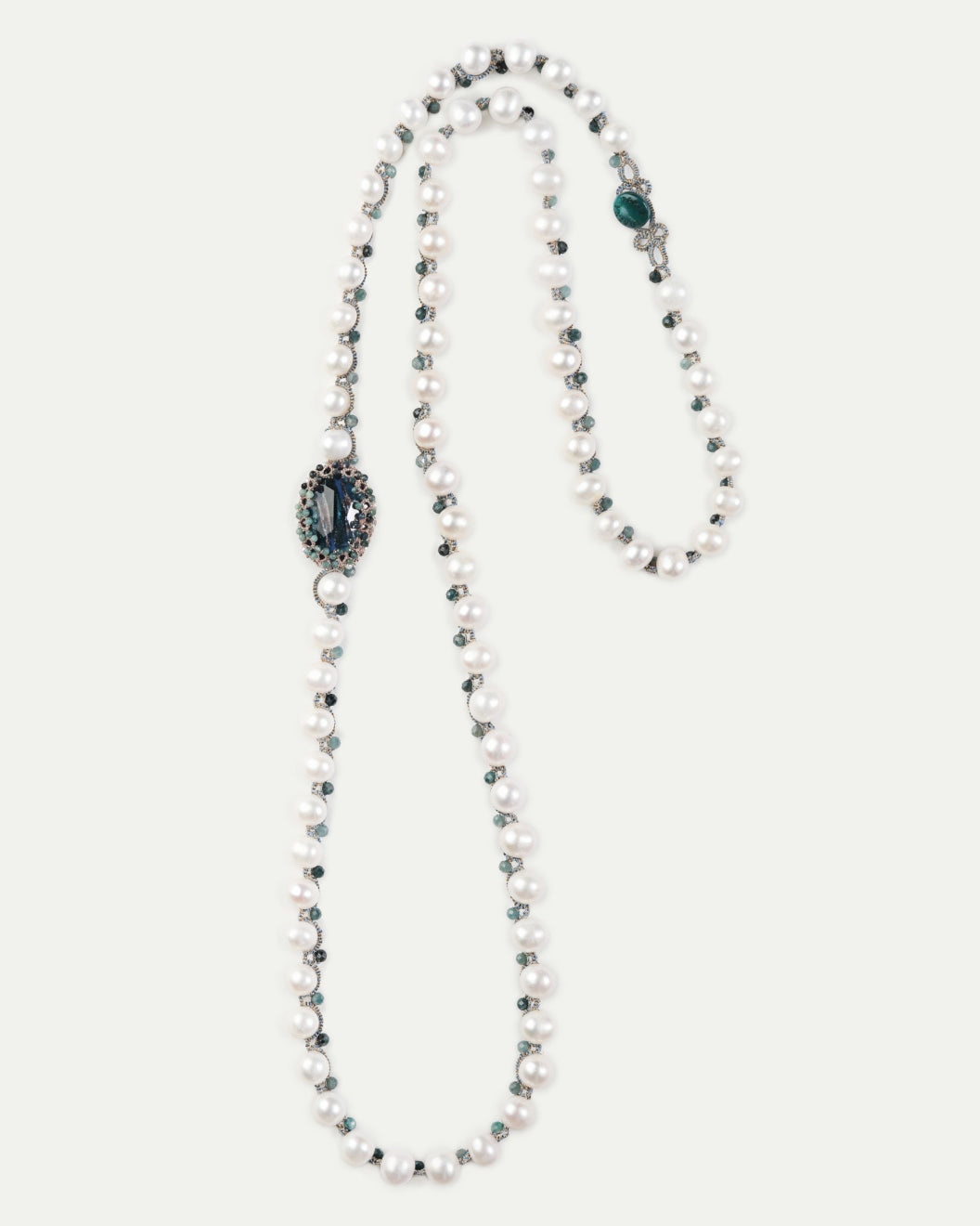 Blue SHAYLA pendant with pearls and bead accents; side view showcasing intricate detailing.