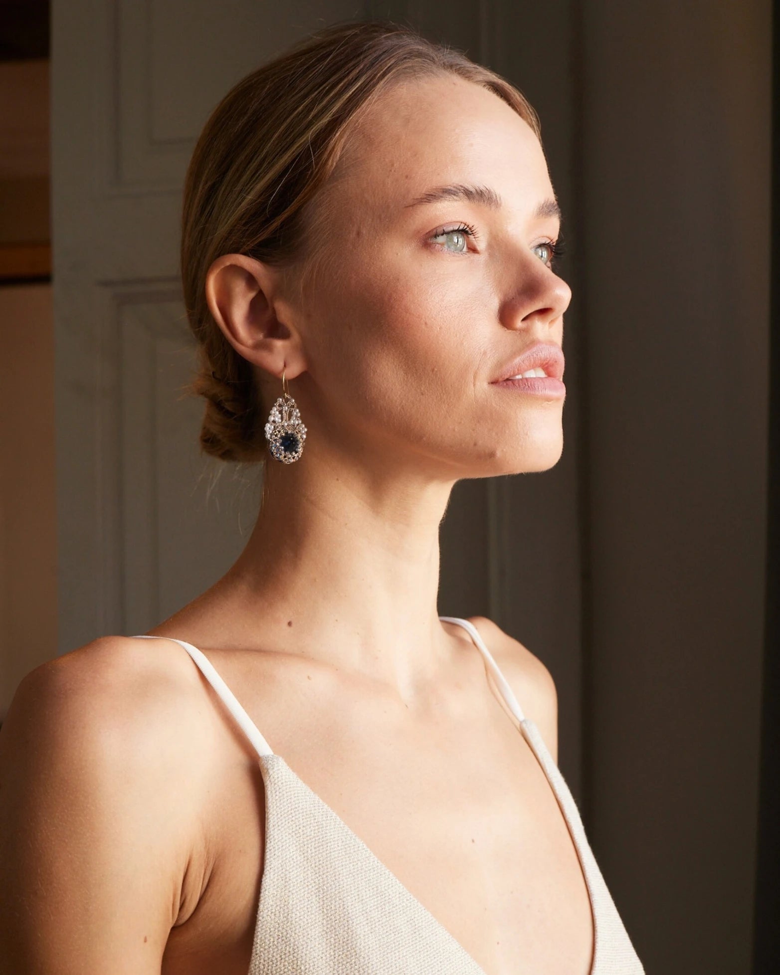 SISSI EARRINGS in Gold, Silver, Pearls color Blue front view with elegant and refined design