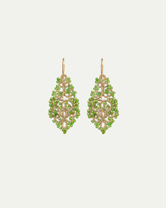 Green silk earrings with intricate gold and silver detailing, highlighting fine texture and craftsmanship.