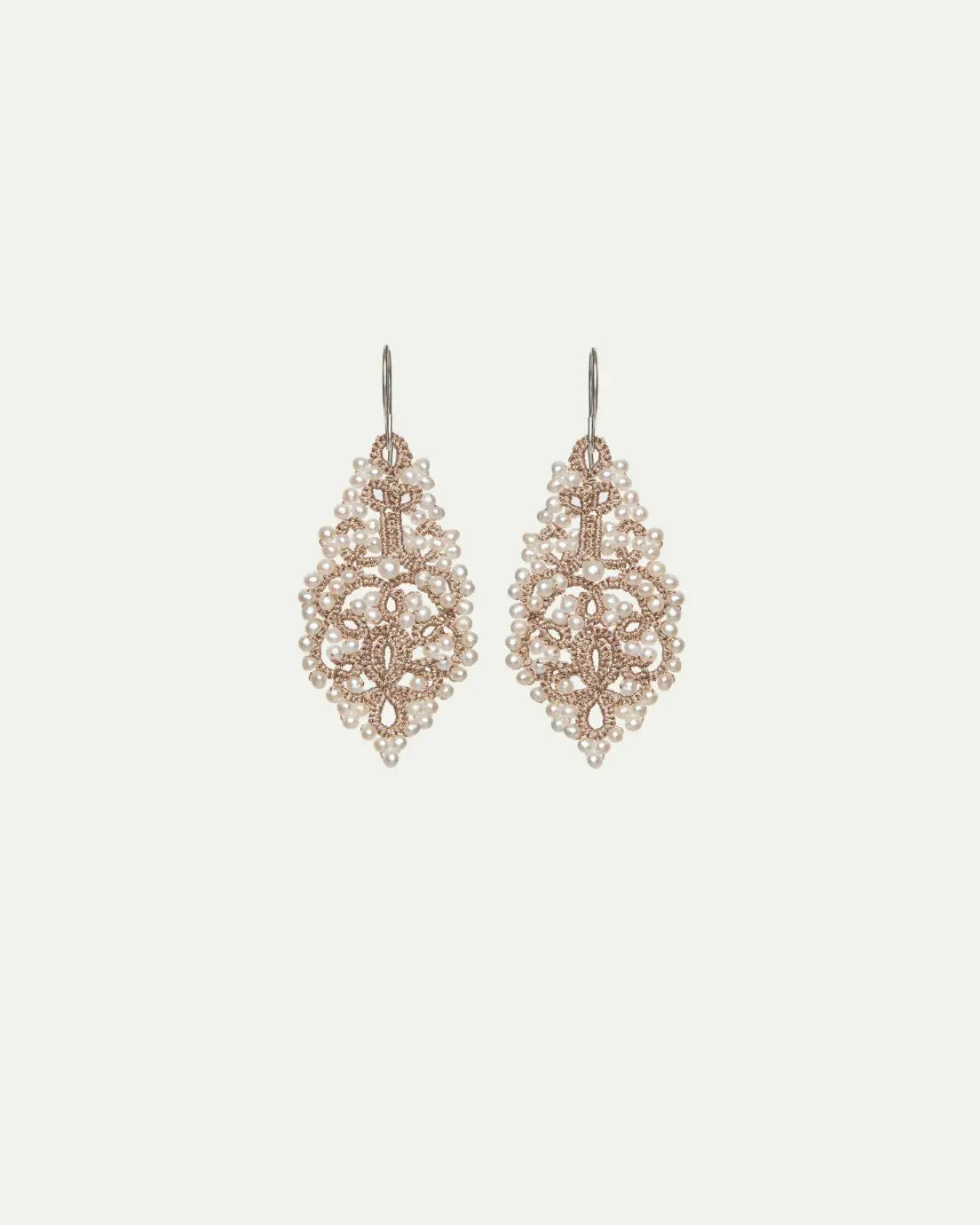 TRIADA Earrings with freshwater pearls and silk thread on silver hooks, intricate white design.