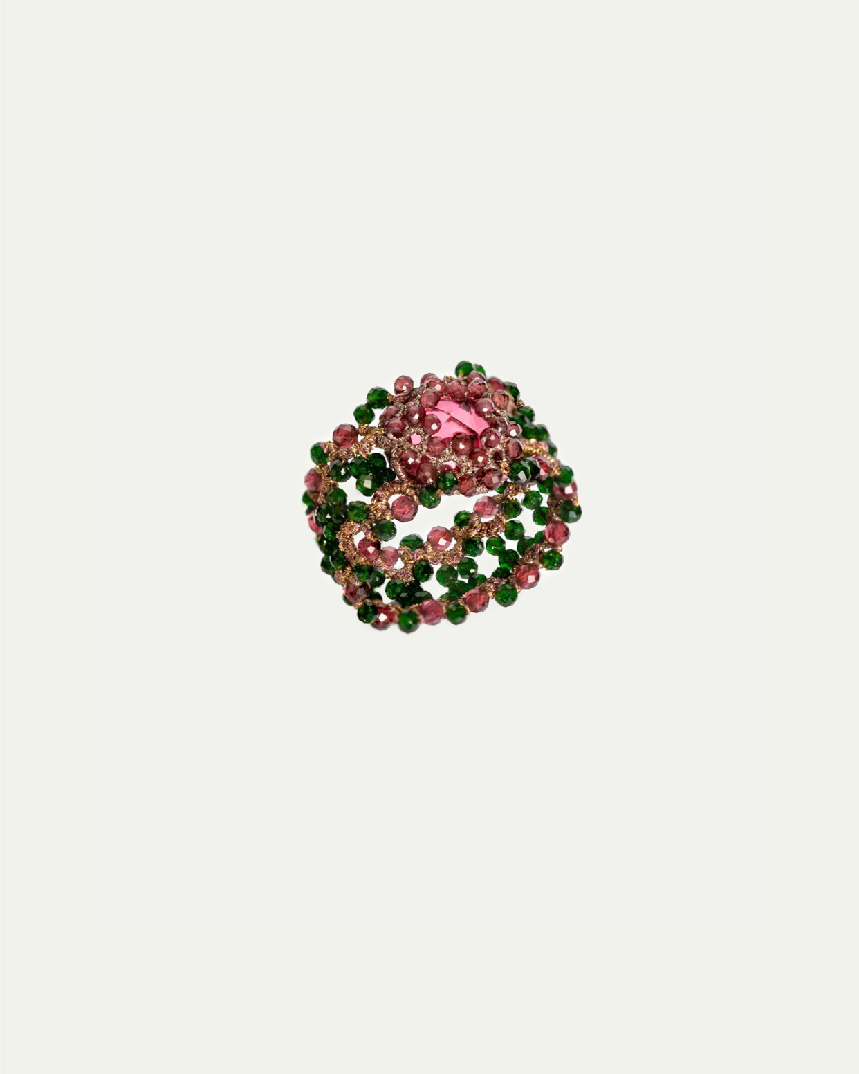 Vanessa Ring featuring crystal, green and pink gemstones, garnet, silk threads, vibrant colors.