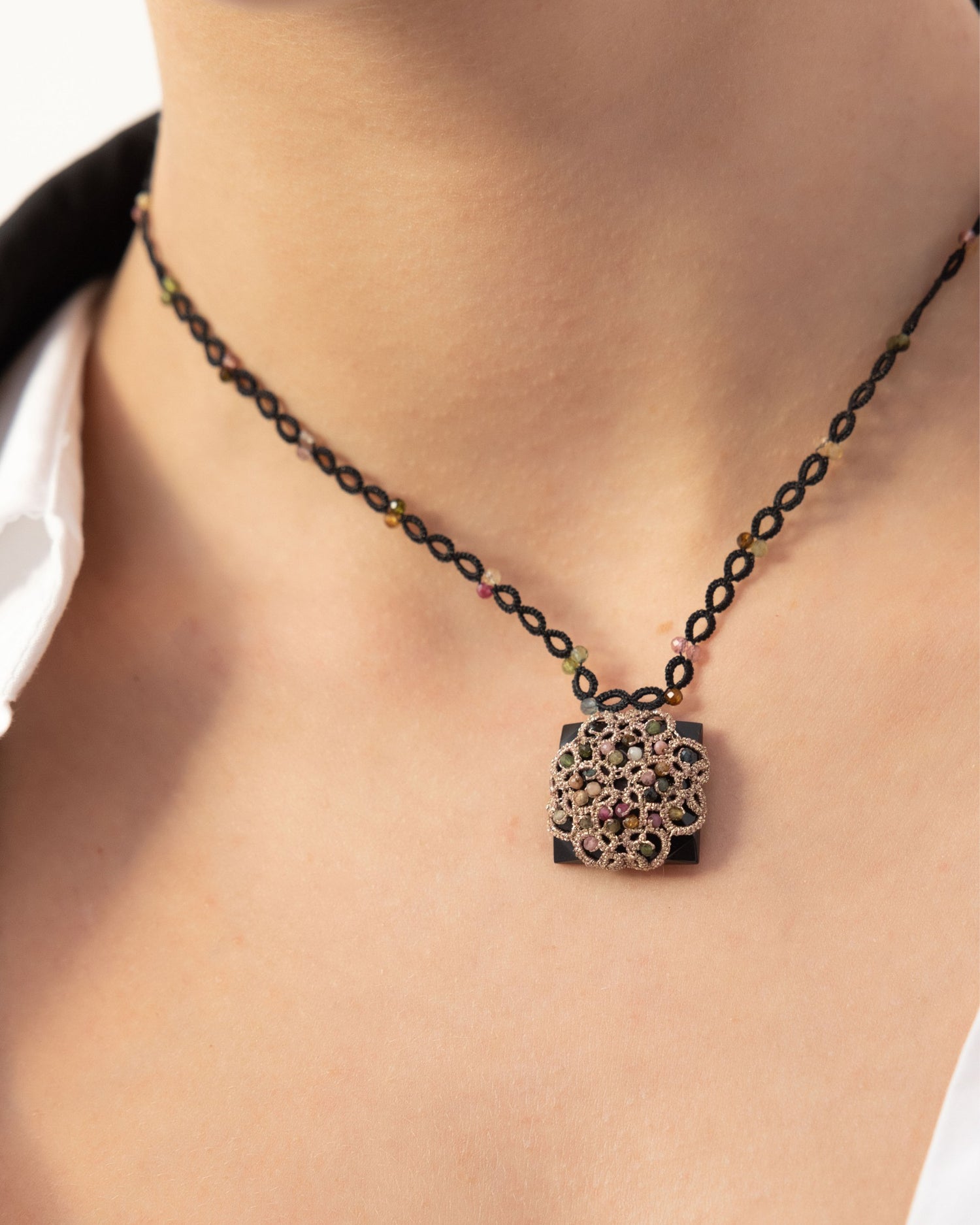 VITTORIA PENDANT in Silk, Pearl, Tourmaline color Black close-up view with premium look and attention to detail